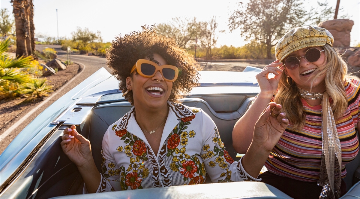 woman in convertible - covid 19