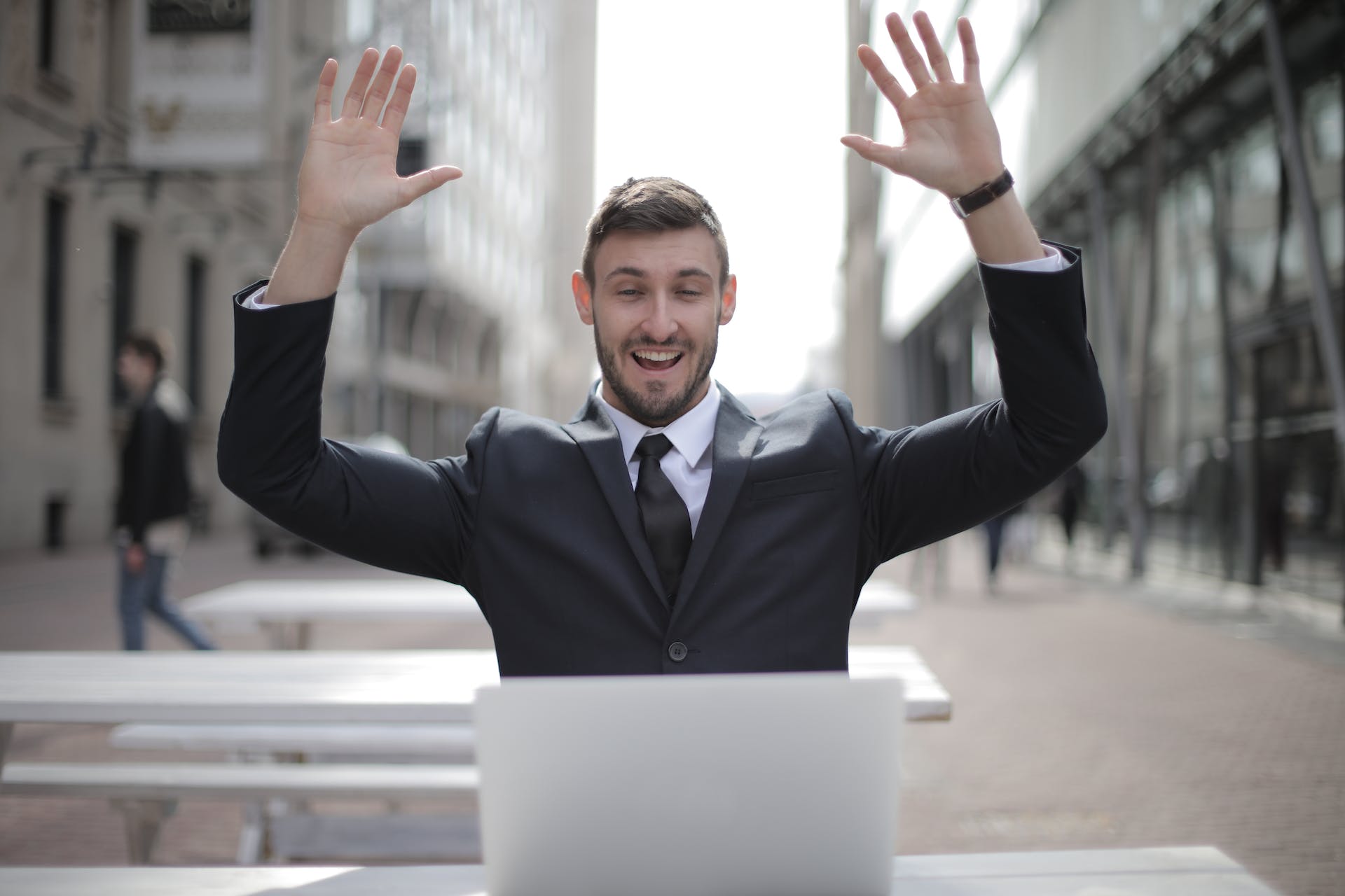 celebrating-man-in-suit-career-goals