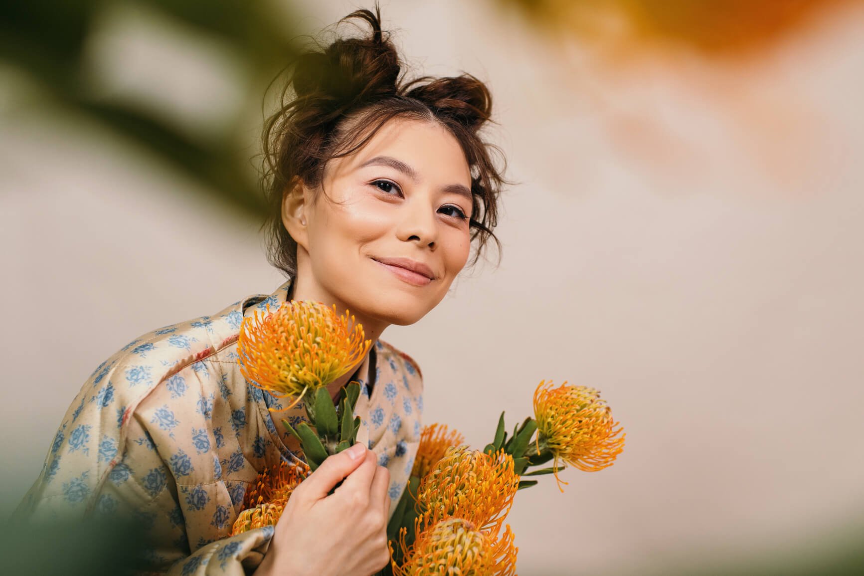 happy-woman-holding-flowers-positive-affirmations