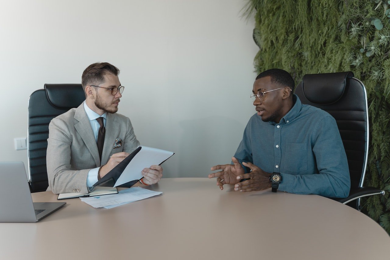 Man-negotiating-with-manager-at-interview-entry-level-salary-negotiation-example