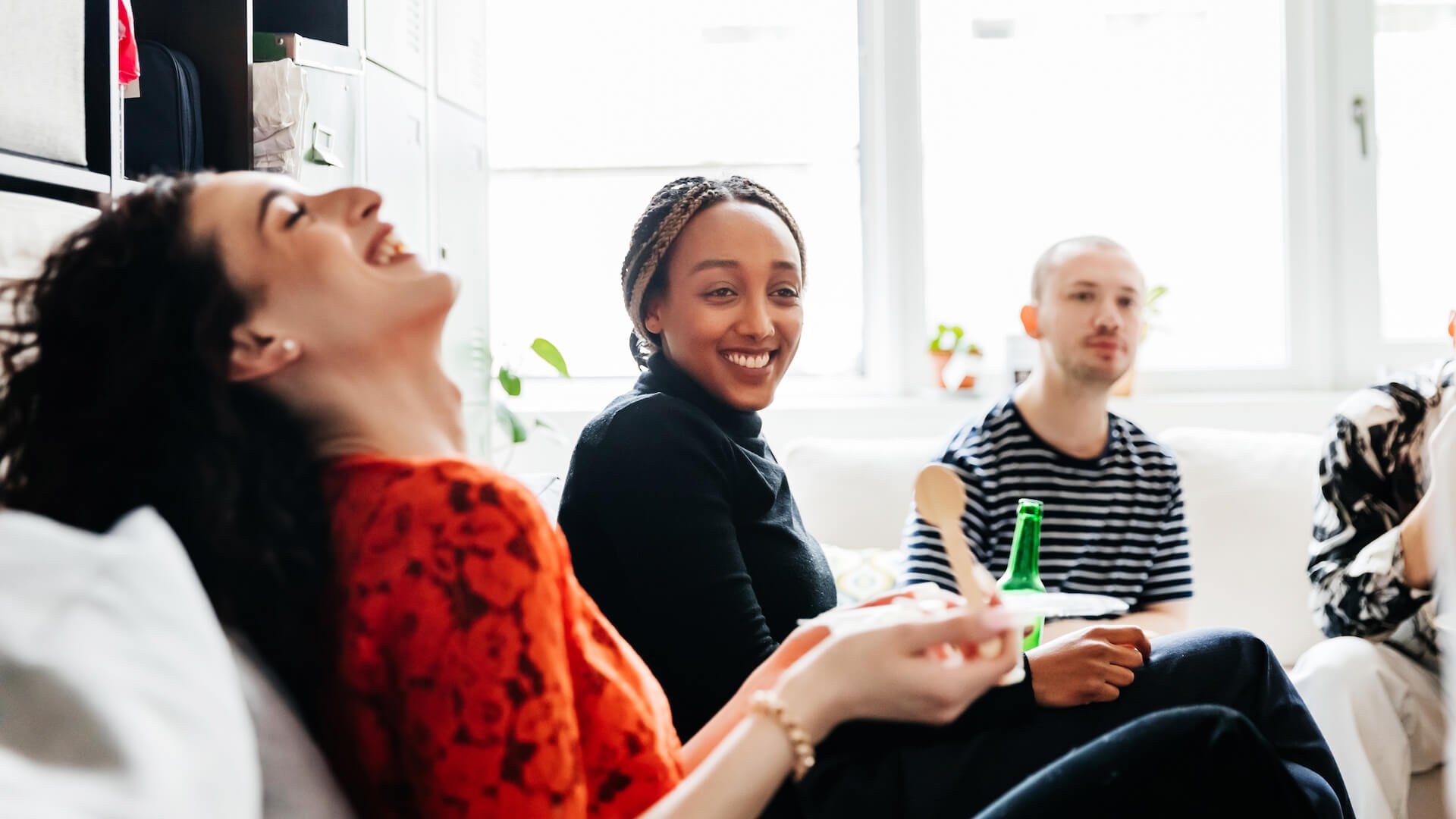 people-laughing-office-social-gathering-interpersonal-skills-at-work