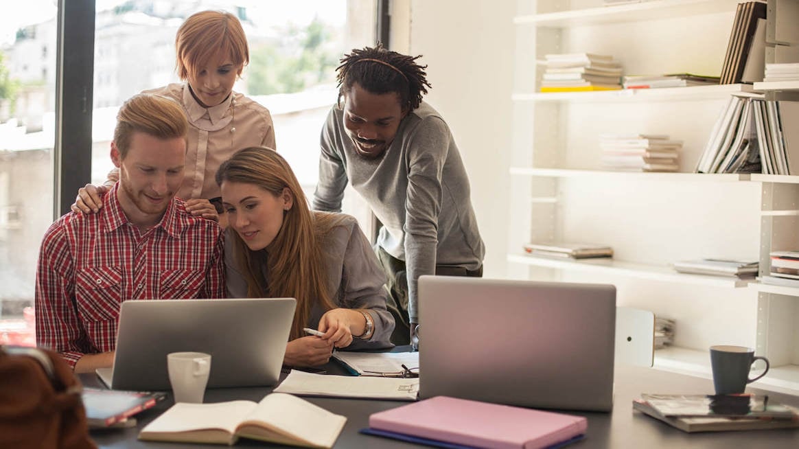 performance-management-coworkers-at-desk