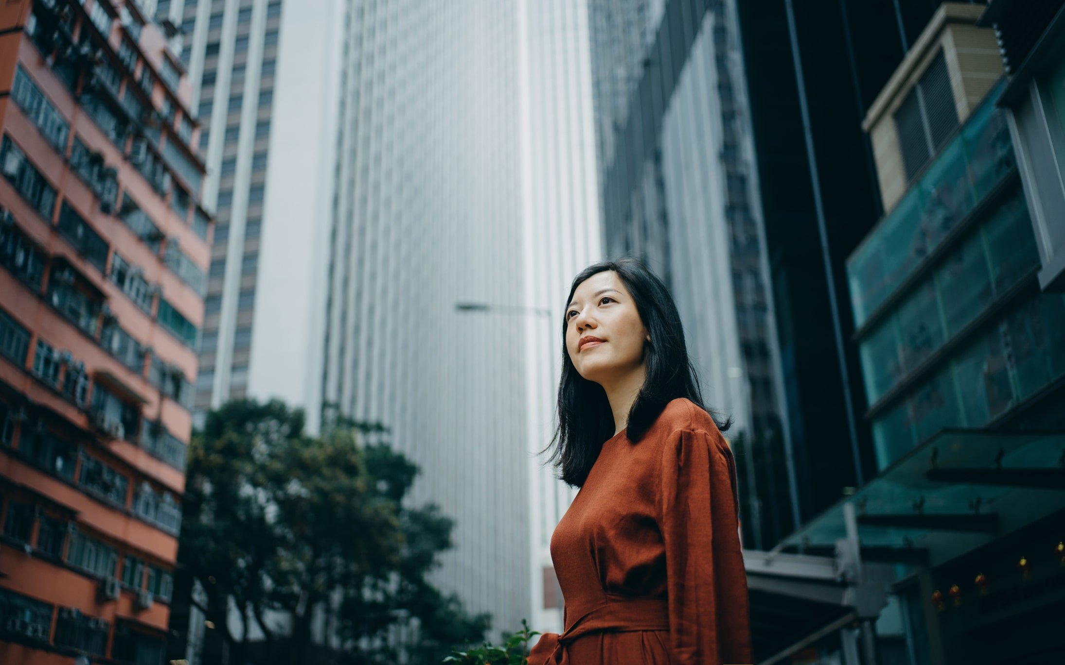 portrait-of-confidence-young-woman -tanding-against-highrise-city-buildings-types-of-goals
