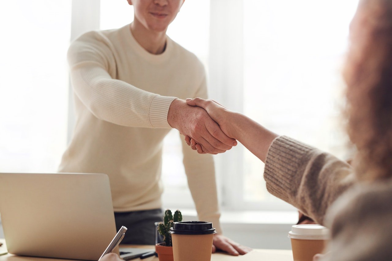 two-people-closing-a-deal-severance-package-negotiation