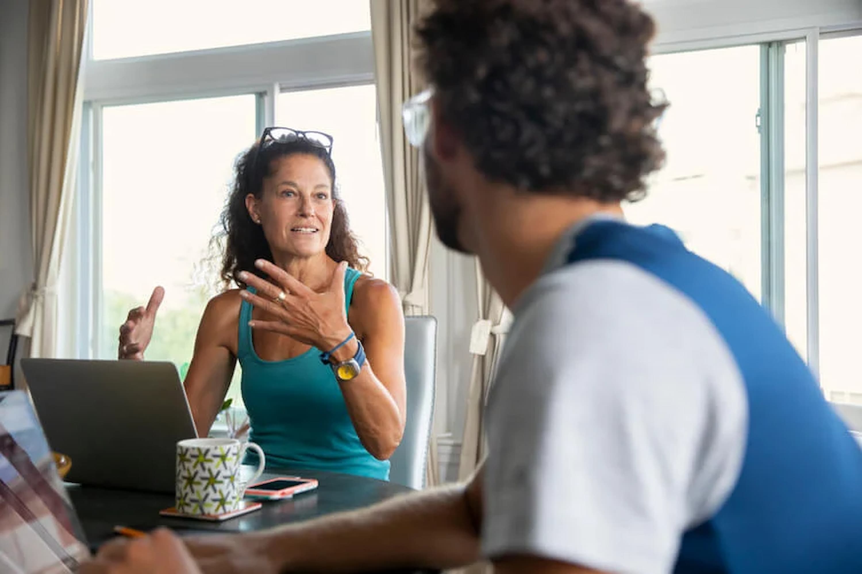 woman-having-a-conversation-with-her-colleague-teaching-them-ways-to-say-no-politely