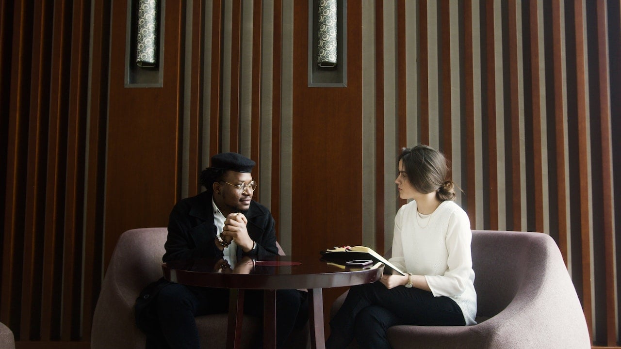 woman-manager-seriously-talking-to-employee-at-one-on-one-meeting-what-is-persuasion