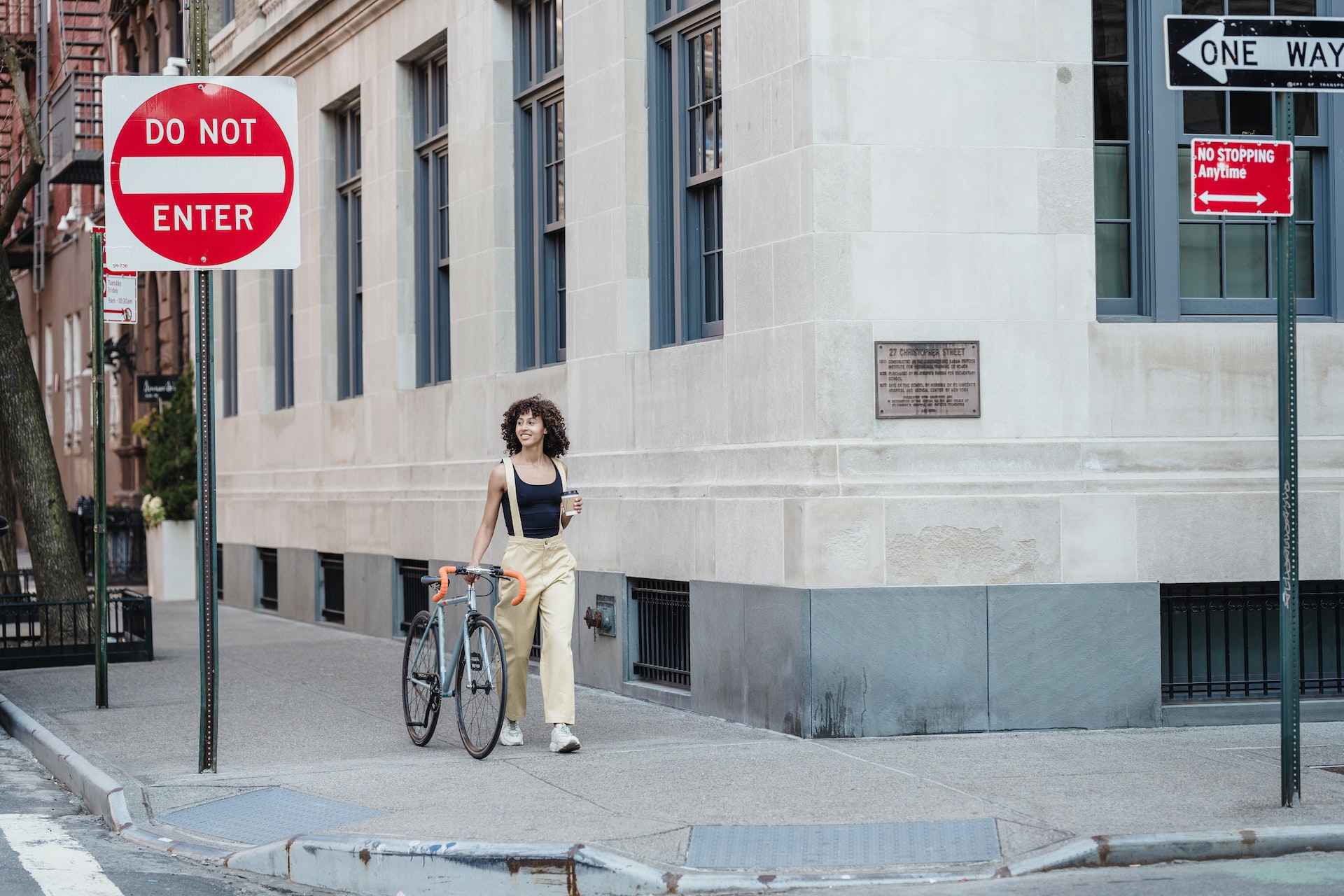 woman-with-bike-walking-around-the-street-how-to-take-control-of-your-life