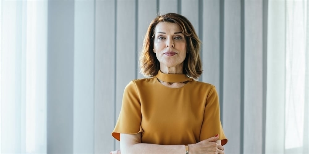 woman-looking-at-camera-effective-communication-strategies